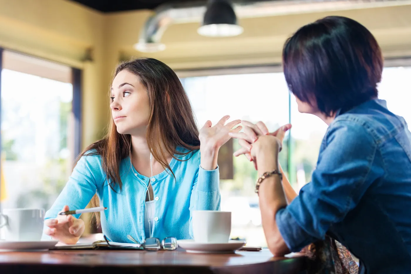 Annoyed woman ignoring bad financial advice